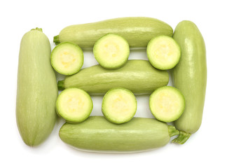 Collection fresh squash vegetable marrow zucchini whole and rings isolated on white background. Flat lay, top view