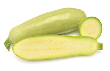 Fresh squash vegetable marrow zucchini whole, half and rings isolated on white background. Flat lay, top view