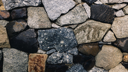 old stone wall of stones