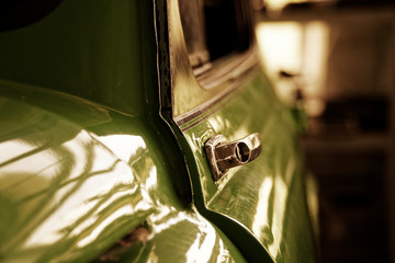 Edge door of car Door handle of retro classic car, Vintage tone