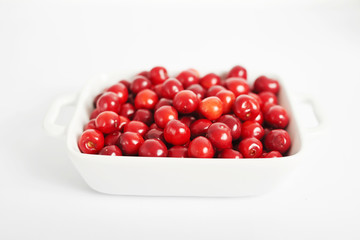 healthy food, sweet cherry on a white background, food for vegetarians and vegans