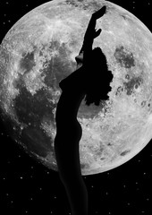  silhouetted nude woman giving praise to the moon