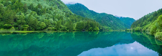 Fototapeta na wymiar Jiuzhaigou scenery, China - June 15, 2017: this is located in China's jiuzhaigou scenic area, a famous tourist destination in China.Most of it is pristine.The color of the lake is the color of nature.