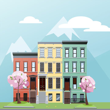 Flat cartoon style illustration of spring city street with mountains. Three-story houses with blooming pink trees and grass lawn. Day Street cityscape