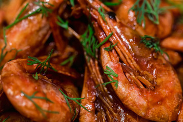 Prepared shrimps with dill close up texture background