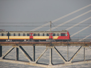 Suburban train on the bridge in Warsaw.