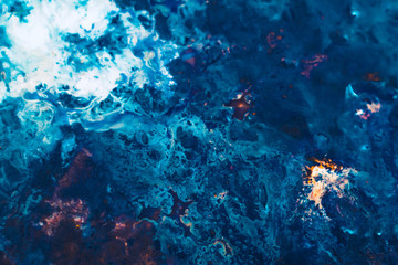 Fototapeta na wymiar Abstract art texture background. Sea surface with reef design. Beautiful blue and white paint mixture with marbled effect.