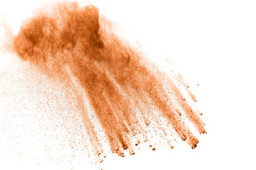 Brown dust cloud.Brown particles splattered on white background.