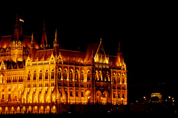 Fototapeta na wymiar Budapest Hungary, 05.29.2019 Hungarian Parliament Building. night Budapest, glowing in gold. facade and roof of an old building