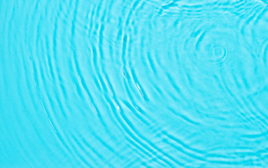 Blue water texture background on the noon sunlight.  