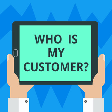 Text sign showing Who Is My Customer. Conceptual photo Know your clients get information of what they want Hu analysis Hand Holding Blank Screen Tablet Smartphone Display Unit photo