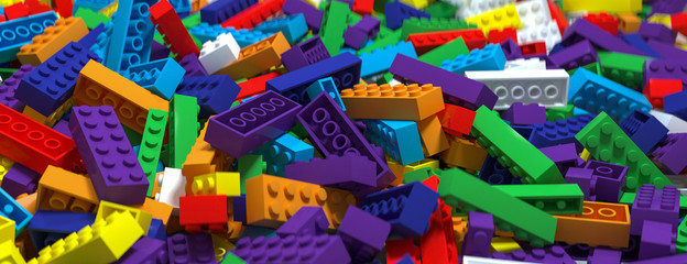 Colored toy bricks background. Rainbow colors. 3D Rendering