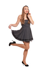 Portrait of young woman posing on white background
