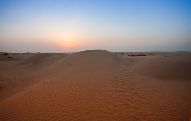 Obraz na płótnie Canvas desert sand and dunes with clear blue sky. Asia