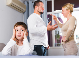 Upset son suffering from parents arguing