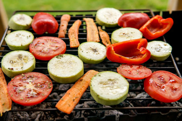 Grill party in a garden.  Healthy food preparing outdoors on summer or spring picnic.