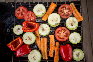 Grill party in a garden.  Healthy food preparing outdoors on summer or spring picnic.