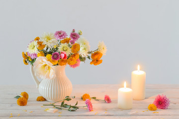 still life with  chrysanthemum and candles