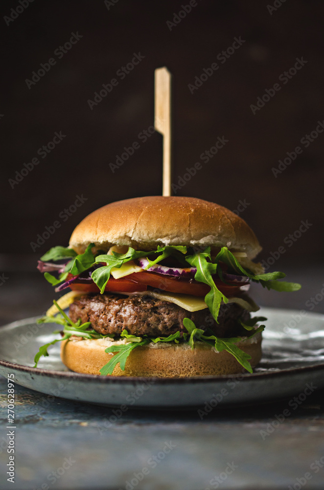 Wall mural tasty hamburger with vegetables and rucola