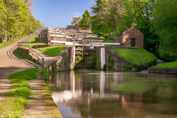 Fototapeta na wymiar Bingley Five Rise Locks on the Leeds and Liverpool canal raise the waterway 60 feet. They were built in 1774.