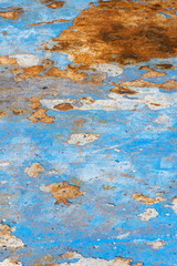 Light blue rusty vintage paint background, color on old pool bottom, brown, yellow, decay texture, autumn concept