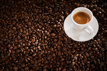 Roasted coffee bean background with espresso