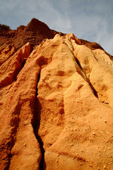 Red rocks on the Praia da Falesia - Falesia beach in Algarve, Portugal.