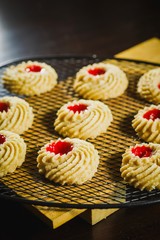 Kuih Semperit is a Malaysian traditional cookie, traditionally served during Hari Raya Aidilfitri to visiting guests. Semperit is made of wheat flour, corn flour, custard powder, sugar and margarine. 