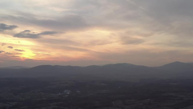 Colorful sky above mountains Stol and Deli Jovan 4K drone video