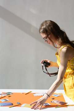 Female Photographer Making Flatlay