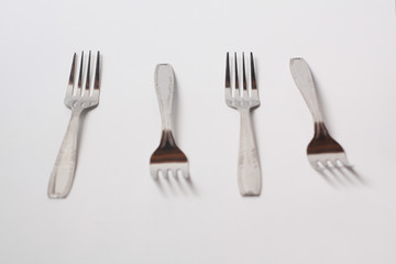 Cutlery , spoon and fork on white background