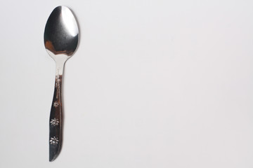Cutlery , spoon and fork on white background