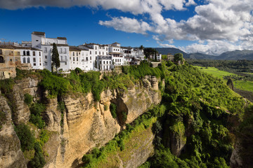 Fototapeta na wymiar El Tajo Canyon on the Guadalevin river with white Ronda buildings Andalusia Spain