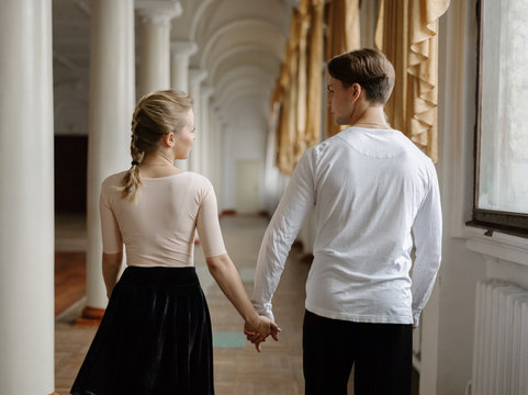 Couple walking in dancing hall