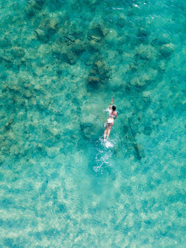 Woman swimming in the South China Sea, Malaysia