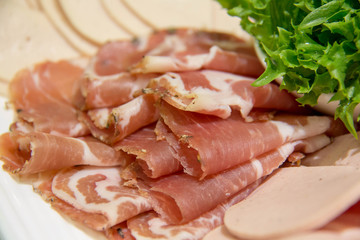  delicious slice salami on plate for buffet