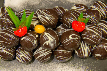 dark chocolate ball on plate in buffet