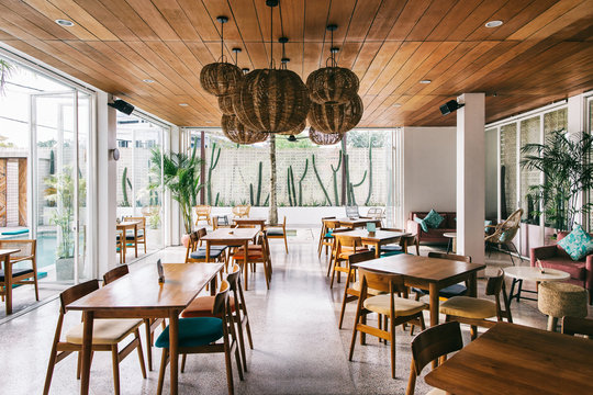 Tropical Interior Design - Restaurant Tables and Chairs in Hip R