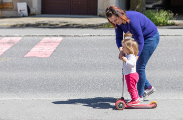 Scooter. Sunny. Day. Daughter. Ride. Street. Mother