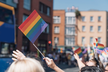 People With Rainbow Flags Attending a Gay pride