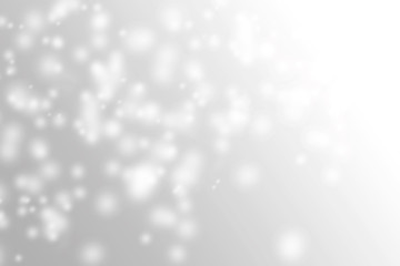 Soft light white and grey snowflake background bokeh design