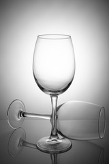 Two empty wine glasses isolated on white background