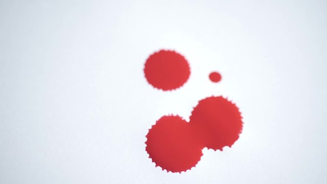 red color drop on white background