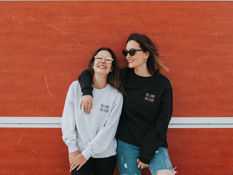 Portrait of two female friends with sunglasses