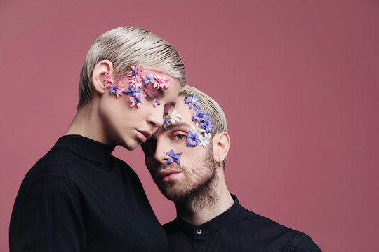 Two people with flowers