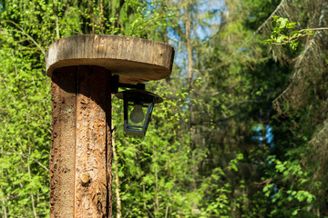 lantern on a wooden post