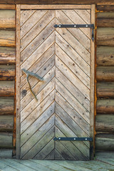 wooden door with a handle branch