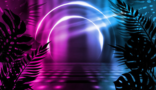 Background of empty dark scenes with neon lights and shapes, smoke. Silhouettes of tropical palm leaves in the foreground. Bright futuristic abstract background © Laura Сrazy