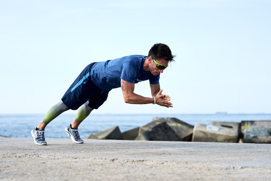 Athlete doing push-ups with claps