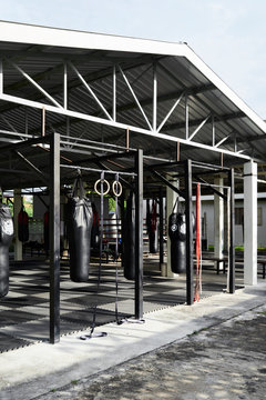 Open Gym With Boxing Bags. Muay Thai Arena.